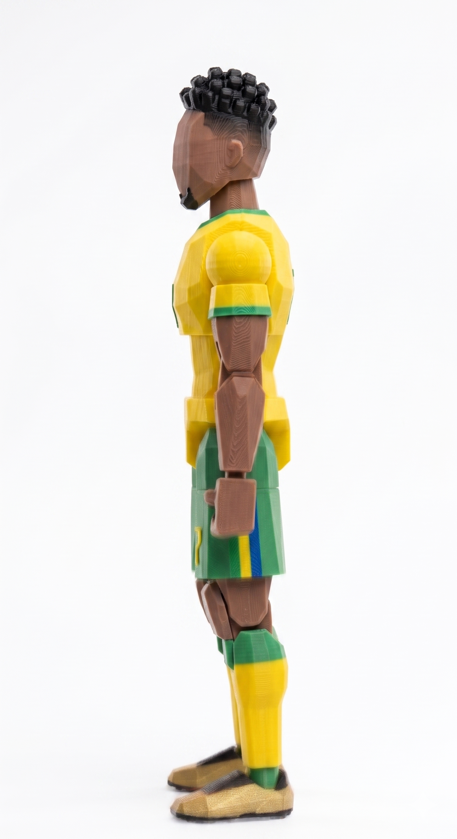 3D printed Brazil football player figurine in yellow green kit low poly style